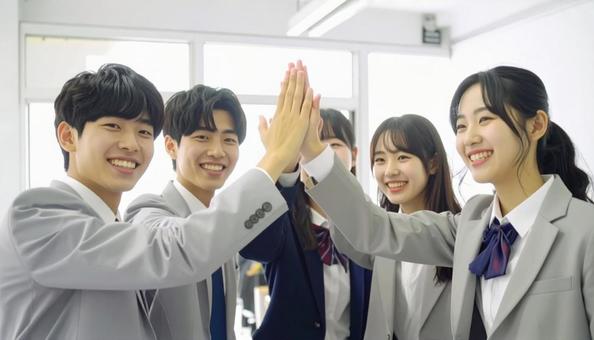 喜びを分かち合う学生 喜びを分かち合う学生の写真