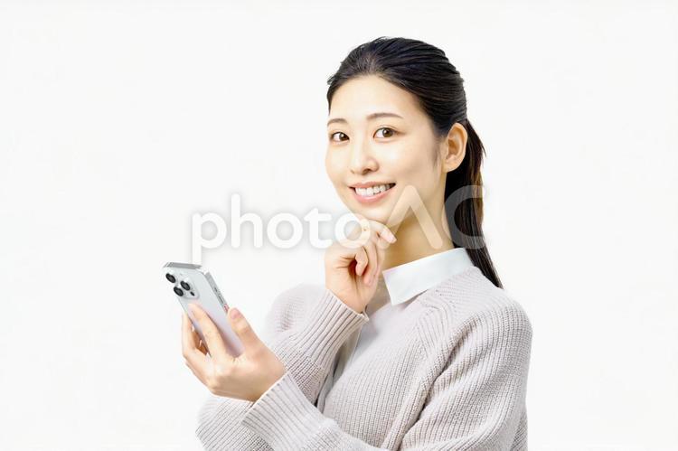 スマートフォンを使うビジネスウーマン ビジネスウーマン,スマホ,メールの写真素材