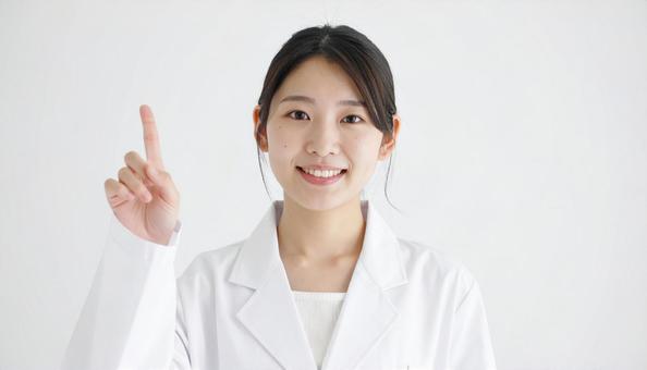 指をさす女医 指をさす女医の写真