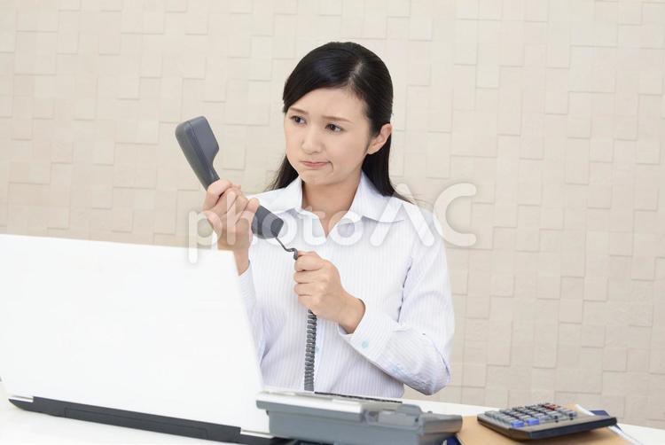 怒った表情のビジネスウーマン 女性,ビジネウーマン,女の写真素材