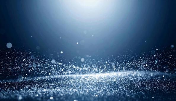 幻想的に輝く光の粒子背景の写真