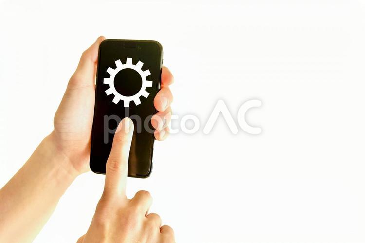 スマホの設定マークとテクノロジー 設定,テクノロジー,スマホの写真素材