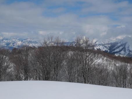 雪山 冬の風景,スキー場,青空の写真素材