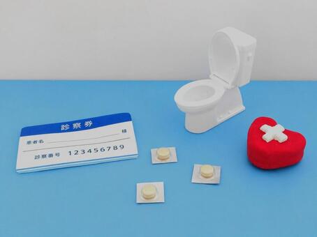 診察券と薬とトイレの医療イメージ 診察券,病院,クリニックの写真素材