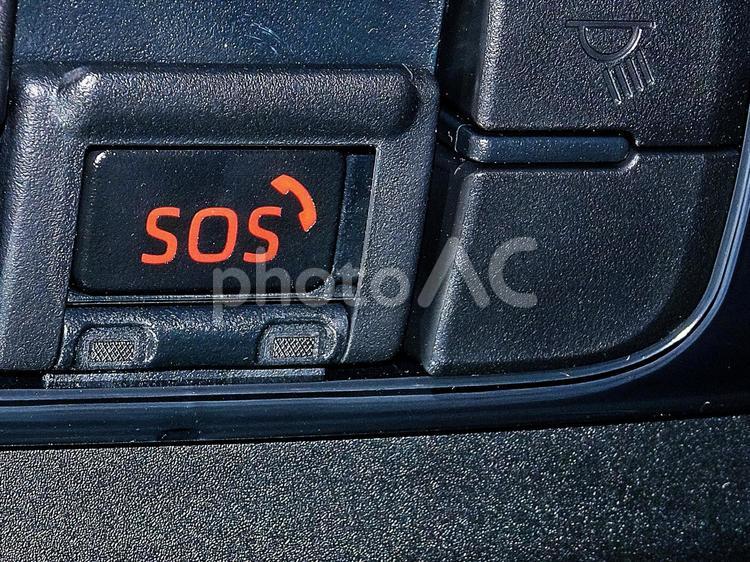 自家用車のSOSボタン sos,アオリ運転,火災発生の写真素材