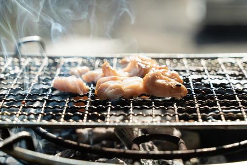 網焼きの肉と煙 網焼きの肉と煙の写真