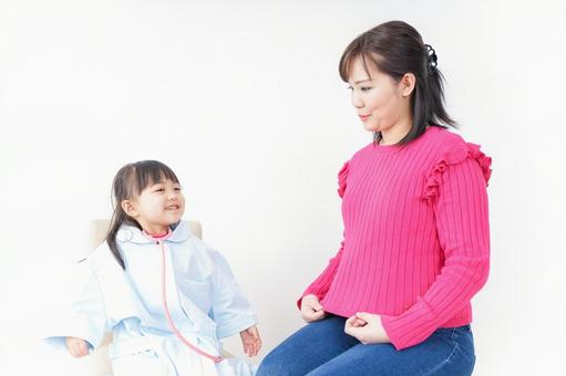 お母さんと子供ドクター お母さんと子供ドクター 面倒を見る,お母さん,お医者さんごっこの写真素材