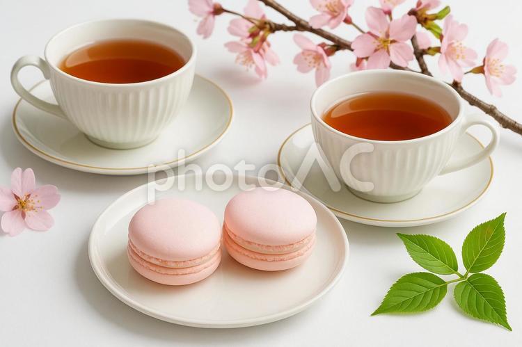 桜とマカロンの春のティータイム 紅茶,カップ,マカロンの写真素材
