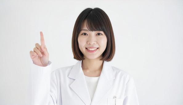 指をさす女医 指をさす女医の写真