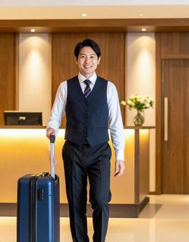 働く人・ホテルマン・お荷物お運びします 働く人・ホテルマン・お荷物お運びしますの写真