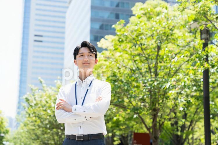 オフィス街の若いビジネスマン ビジネスマン,ビジネス,若いの写真素材