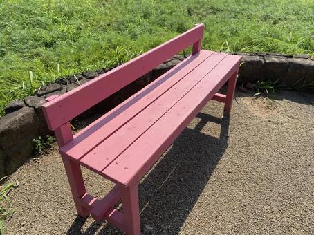 ピンクのベンチ ベンチ,休憩スペース,自然の写真素材