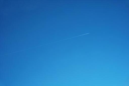 Clear blue winter sky and contrails, JPG