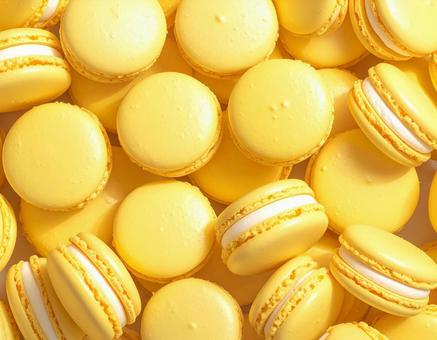 レモンイエローのマカロンの背景素材　2の写真