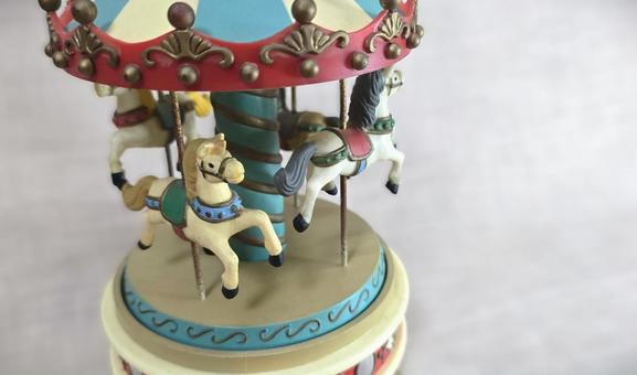 オルゴール オルゴール,メリーゴーランド,馬の写真素材