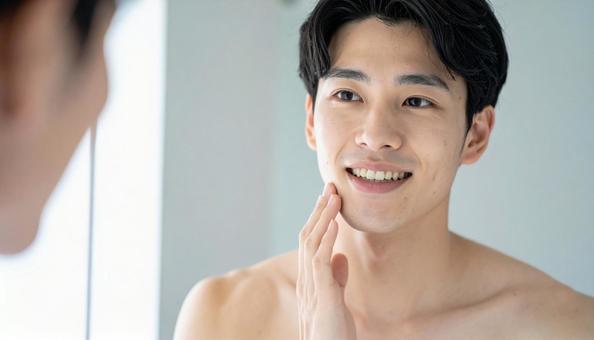 Man looking in the mirror, whitening and teeth alignment, mirror, male, people, JPG