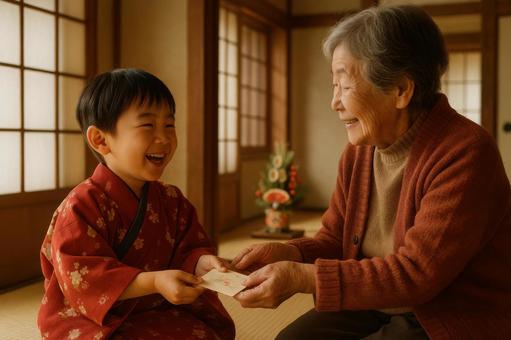 お年玉を受け取る子ども お年玉を受け取る子どもの写真