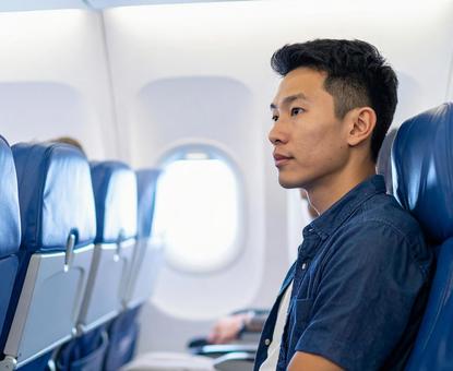 飛行機の乗客 飛行機の乗客の写真