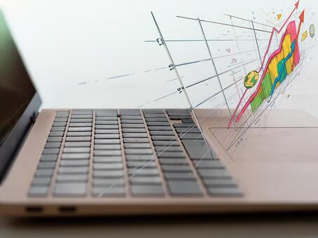 グラフとパソコンを組合わせたビジネス分析 パソコン,グラフ,上昇の写真素材