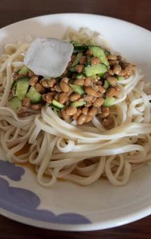 Udon noodles with natto, pickled cucumber and egg in a traditional broth, lunch, lunch, udon, JPG