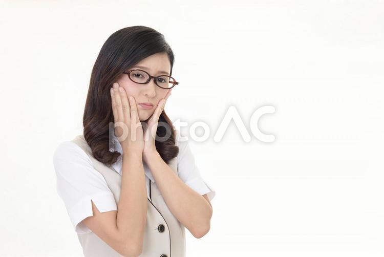 疲れた表情のビジネスウーマン 女性,ビジネウーマン,女の写真素材