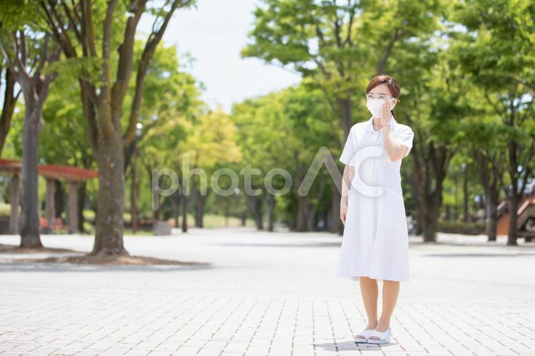 マスクをした白衣の女性 看護師,ナース,マスクの写真素材