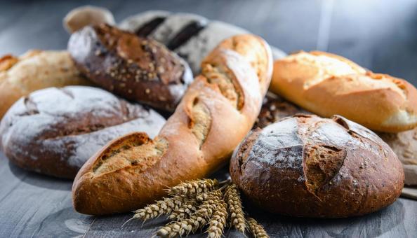 パンの盛り合わせ・朝食イメージ パンの盛り合わせ・朝食イメージの写真