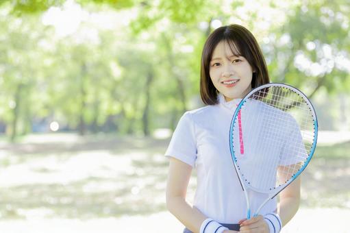 テニスを楽しむ女性 テニスを楽しむ女性 テニス,女性,ラケットの写真素材