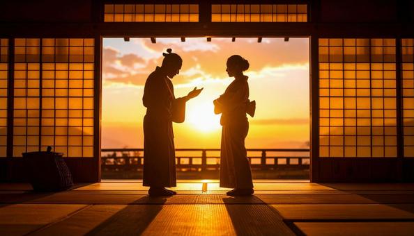 怒って腕組をする女性に頭を下げて謝る男性 怒って腕組をする女性に頭を下げて謝る男性の写真