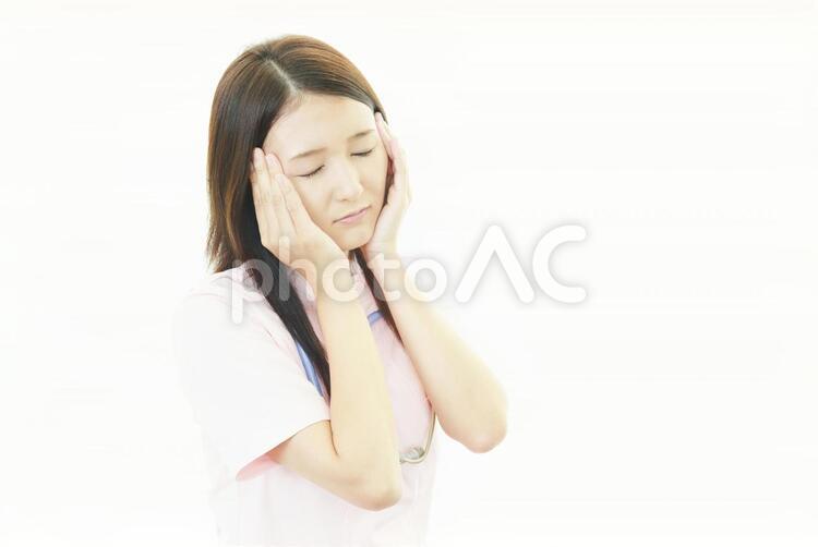 疲れた表情の看護師 女性,看護師,看護士の写真素材