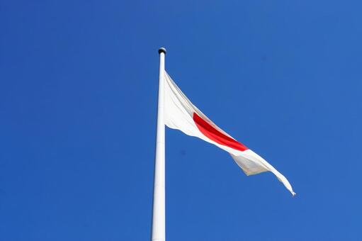 青空の風になびく日の丸3　国旗背景素材 日の丸,日本,国旗の写真素材