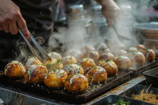 湯気立つ熱々のたこ焼き 湯気立つ熱々のたこ焼きの写真