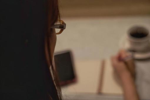 Woman with glasses taking notes, JPG Woman with glasses taking notes, JPG