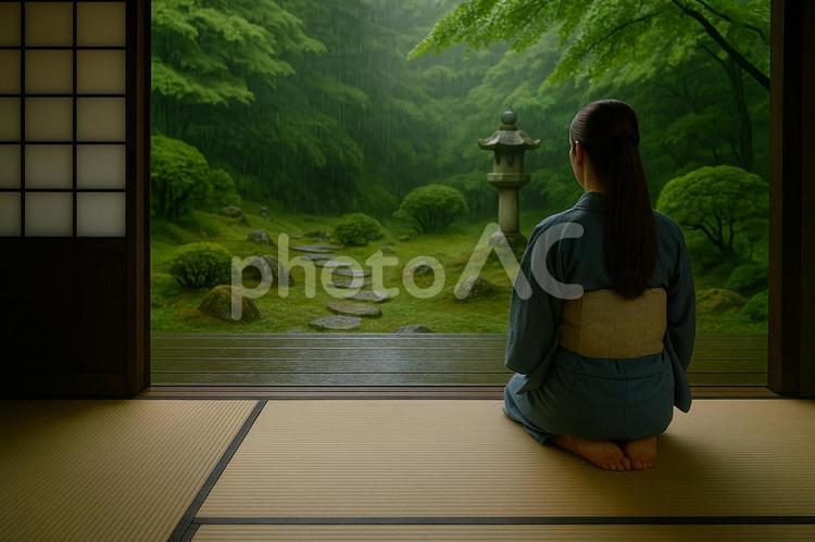 雨の庭を見つめる浴衣の女性 女性,浴衣,畳の写真素材