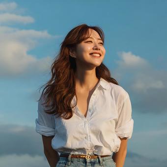 光に包まれた女性の美しいポートレート 光に包まれた女性の美しいポートレートの写真