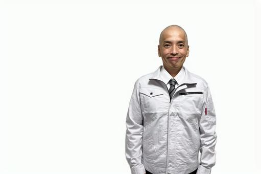 作業着の笑顔が爽やかな中年男性 作業着の笑顔が爽やかな中年男性 作業服,作業員,作業着の写真素材