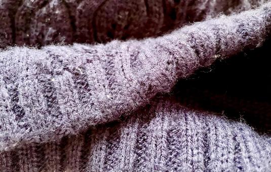 紺色のセーターの編み目テクスチャ 紺色のセーターの編み目テクスチャの写真