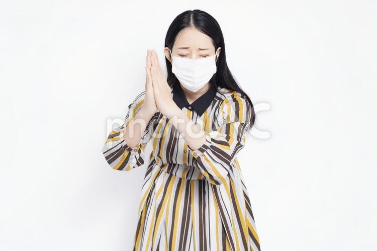 マスクをした女性 女性,マスク,病気の写真素材