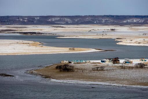 冬の霧多布湿原と蛇行する琵琶瀬川 湿原,冬,自然の写真素材