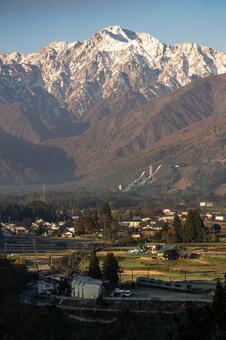 大糸線と白馬三山 白馬,朝,信州の写真素材