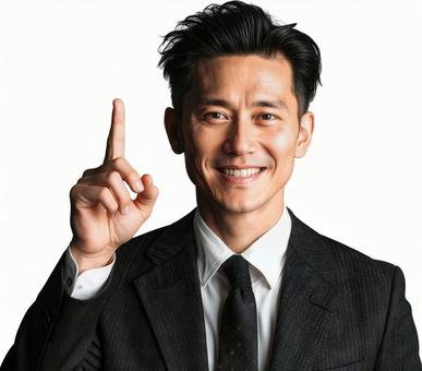 人差し指を立てて笑顔で説明する男性 人差し指を立てて笑顔で説明する男性の写真