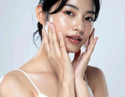 若い女性のスキンケアイメージ 若い女性のスキンケアイメージの写真