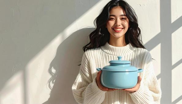 鍋と女性 鍋と女性の写真