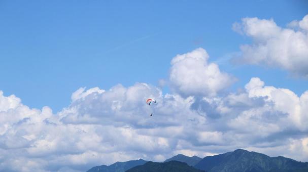 夏の白馬村の空 夏の白馬村の空 夏,空,パラグラーダーの写真素材