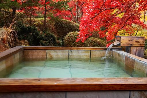 Open-air bath in the autumn leaves Open-air bath in the autumn leaves