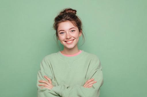 幸福感を表すティーンエイジャーの笑顔 幸福感を表すティーンエイジャーの笑顔の写真