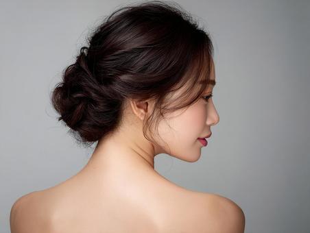 洗練されたヘアスタイルの女性 洗練されたヘアスタイルの女性の写真