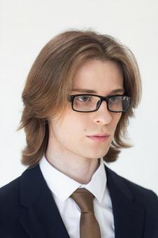 スーツを着てメガネの男性 男性,外国人,欧米人の写真素材