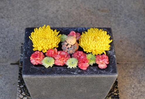 菊の花手水 花手水,菊,仏様の写真素材