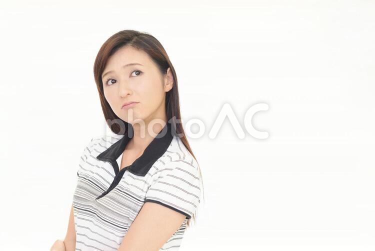 不満そうな表情の女性 女性,女,ストレスの写真素材